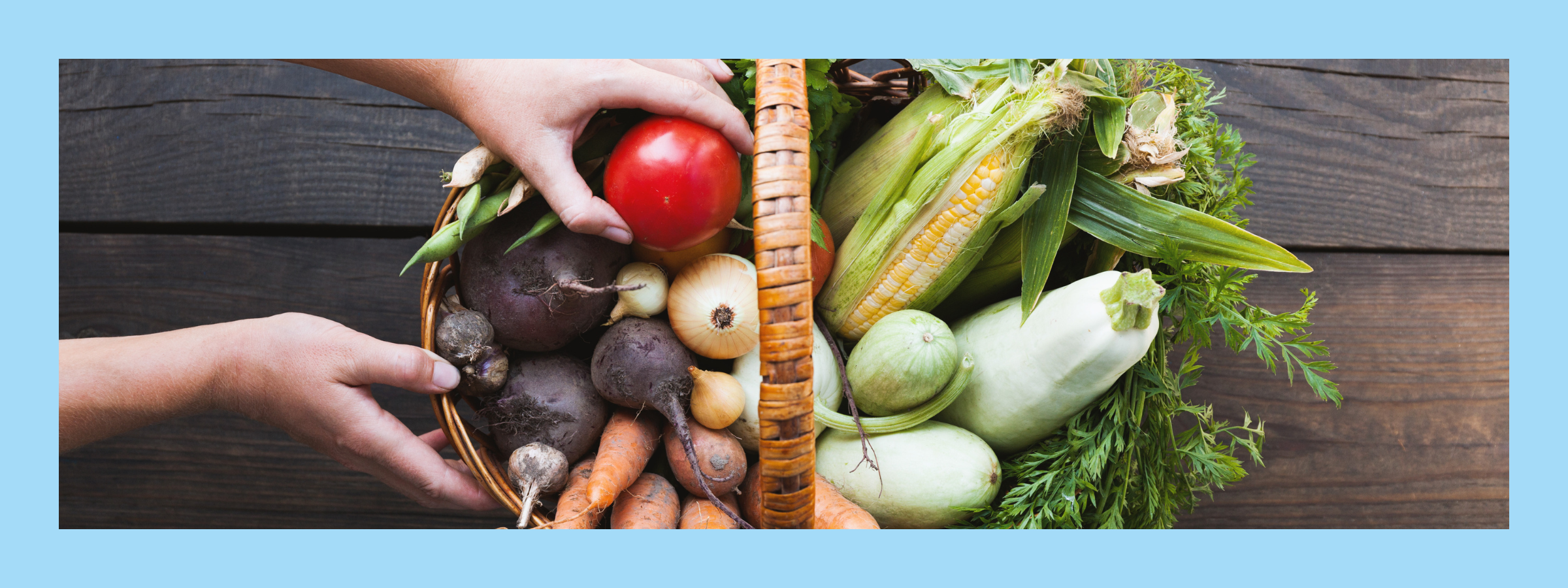 Assorted fruits and vegetables arranged in a basket as nutritional options for easing chemo-related nausea