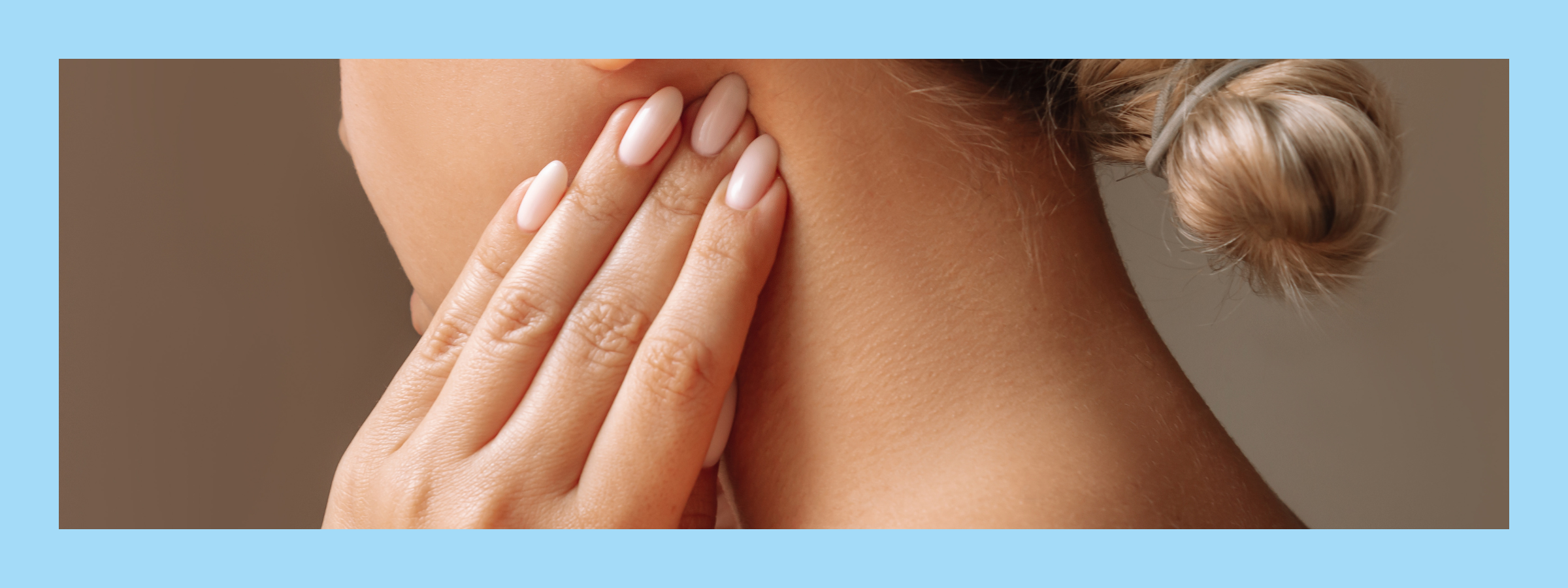 a women feeling her neck for lymphoedema symptoms